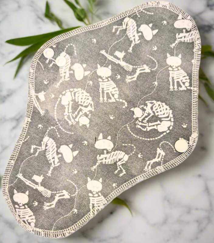 light grey backgrounds with drawn skeleton cats in various cat poses