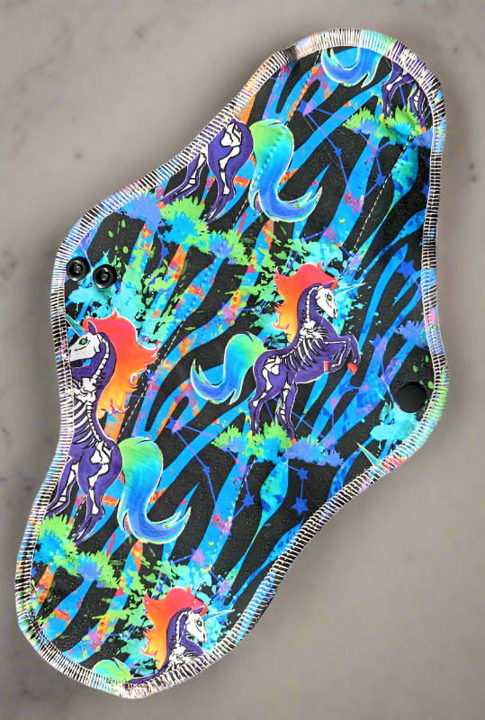 Skelecorn - A skeletal Unicorn with flaming hair on a animal print background of blues and black