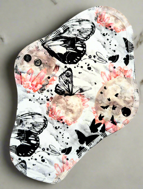 Butterflies & Crystals - Cotton Spandex black butterflies with cream mounds with red crystals 