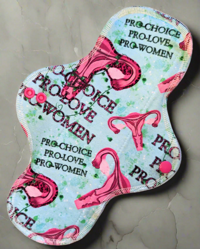 Prochoice, prolove, prowomen , baby blue background with red uteruses.