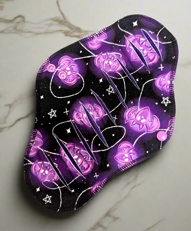 bat shapes purple lights with stars connected by a string