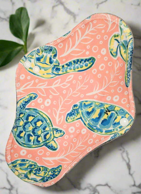 Sea Turtles pique - like pink back ground with bubbles and plant outlines, beautiful sea turtles floating arounf