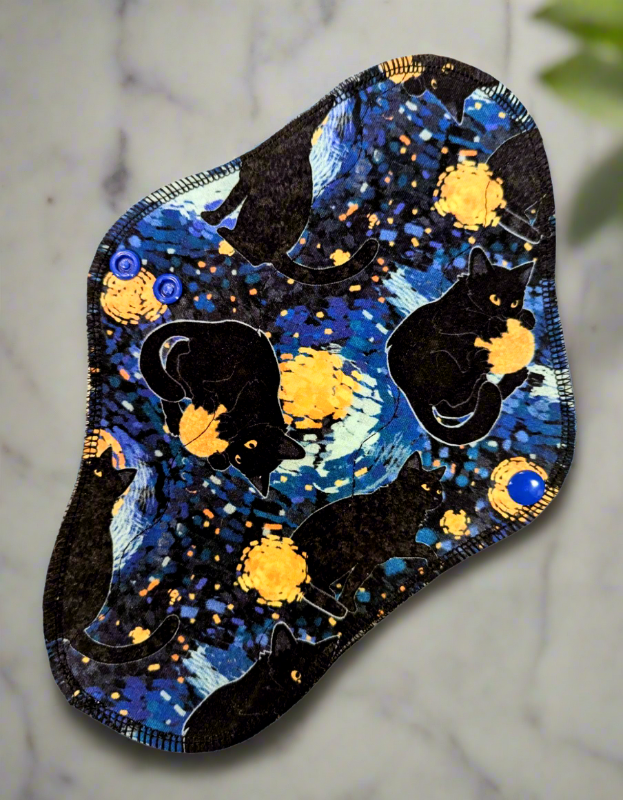 Starry Cat – A Van Gogh-inspired Starry Night with playful cats.