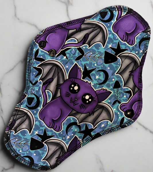 Bat Cats - Cotton Spandex - Purple cats with sharp bat teeth and grew bat wings, surrounded with moons, stars and fish bones