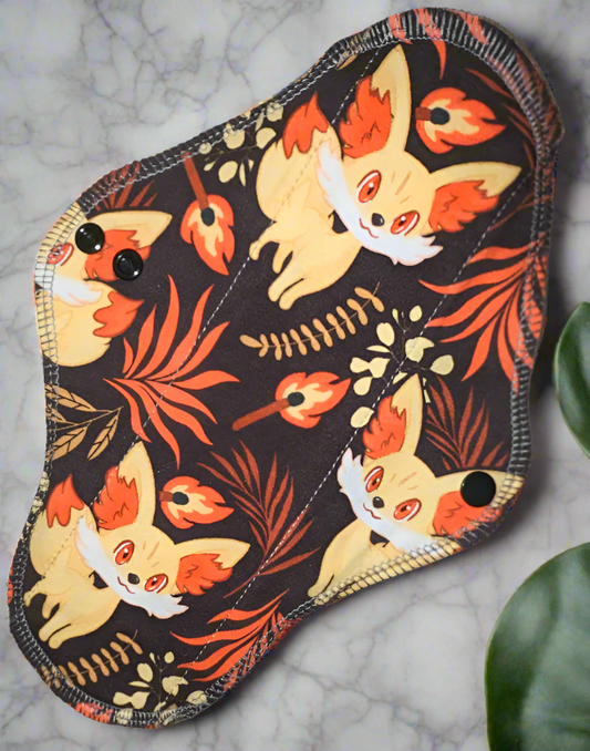 Fire Fox – Fiery foxes with vibrant flames, set against a striking black background.